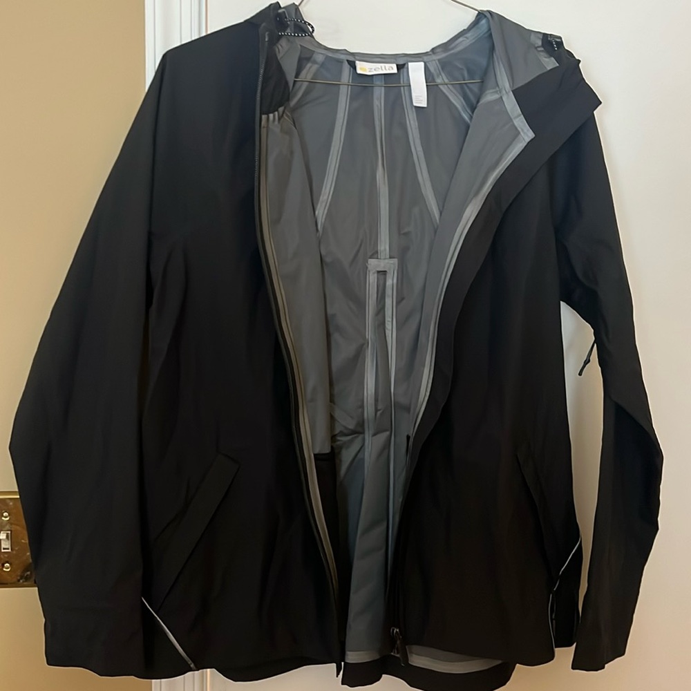 Zella black hooded light weight rain jacket with back zip